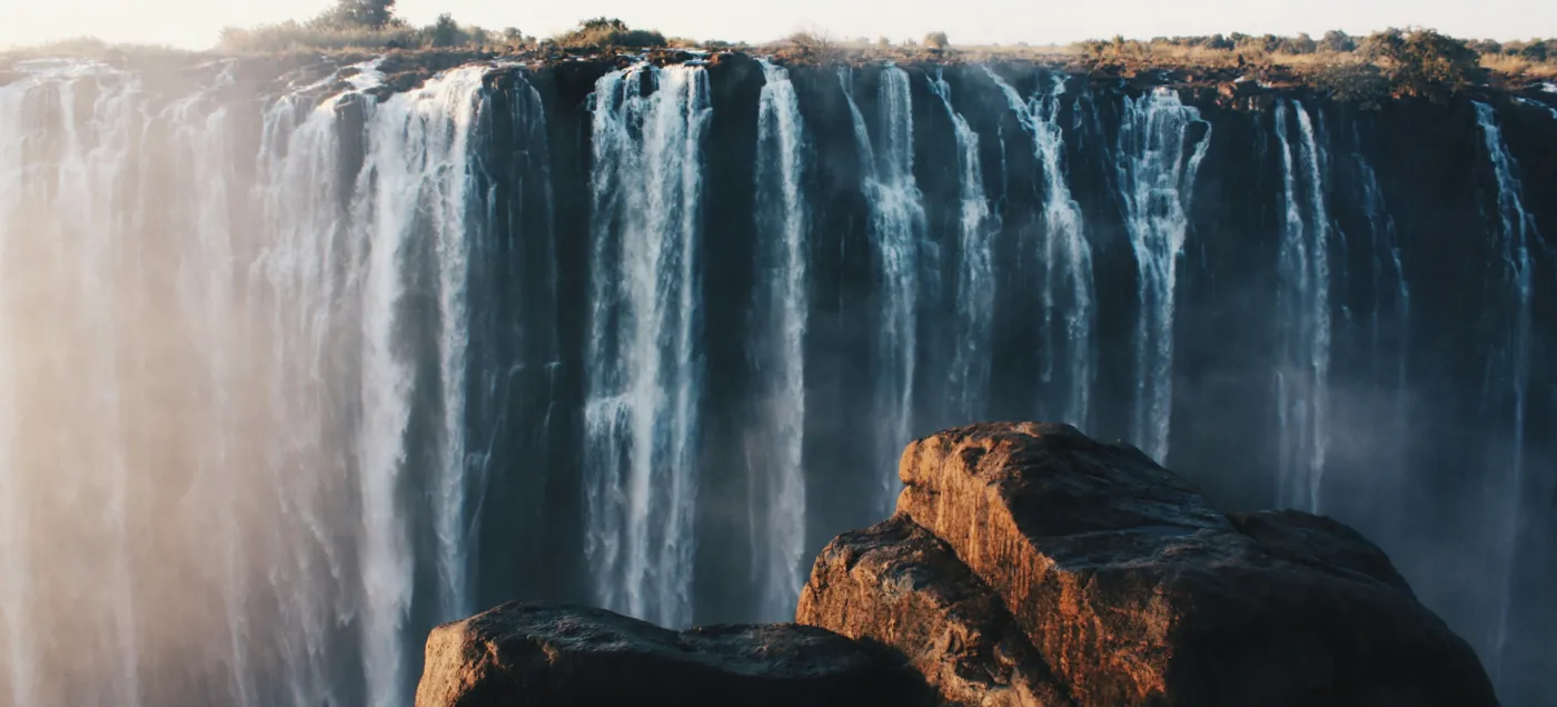 The main curtain of Victoria Falls with rising spray