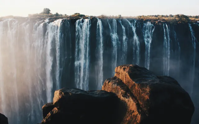 The main curtain of Victoria Falls with rising spray